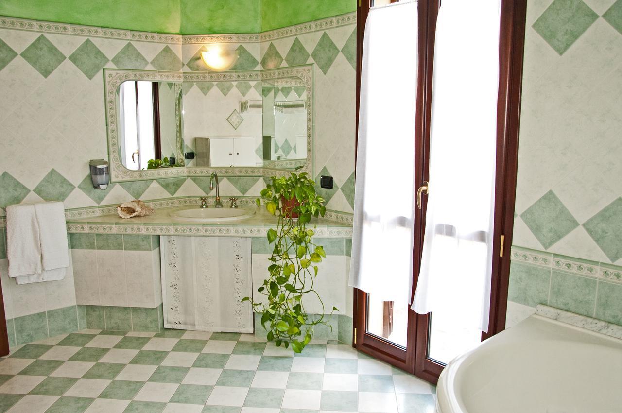Casa Vacanze Sandalia บอซา ภายนอก รูปภาพ